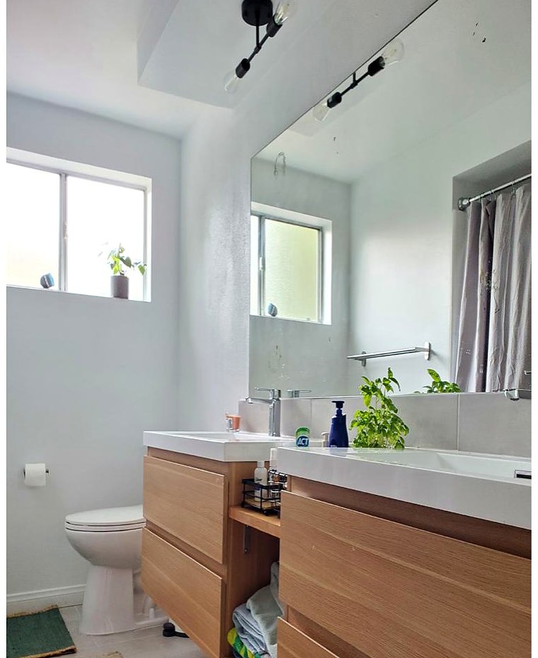 Renovated bathroom with floating timber vanity