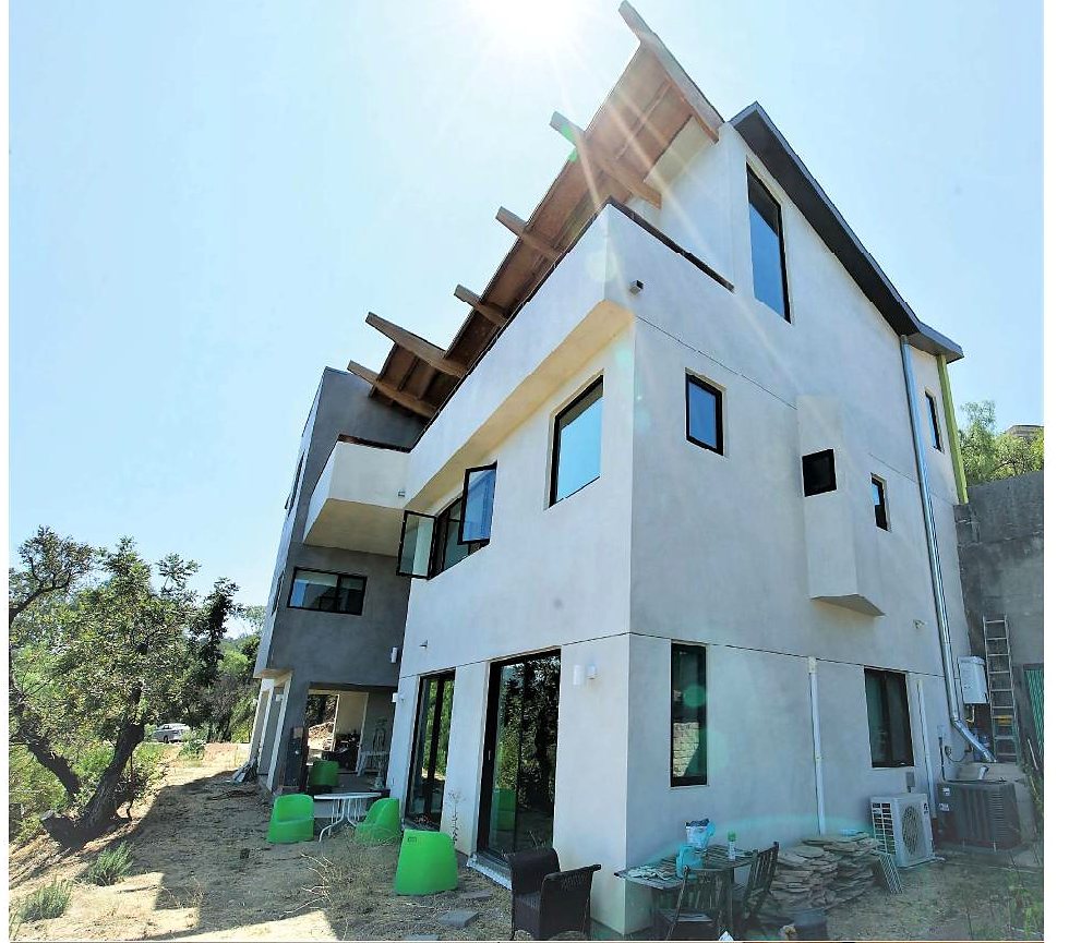 The Woodhill House hillside exterior